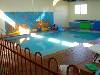 5.5 m by 9 m Hydrotherapy/Toddler Program pool heated to 34 degrees. 1.3m deep with stair access